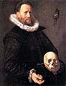 A Man Holding a Skull